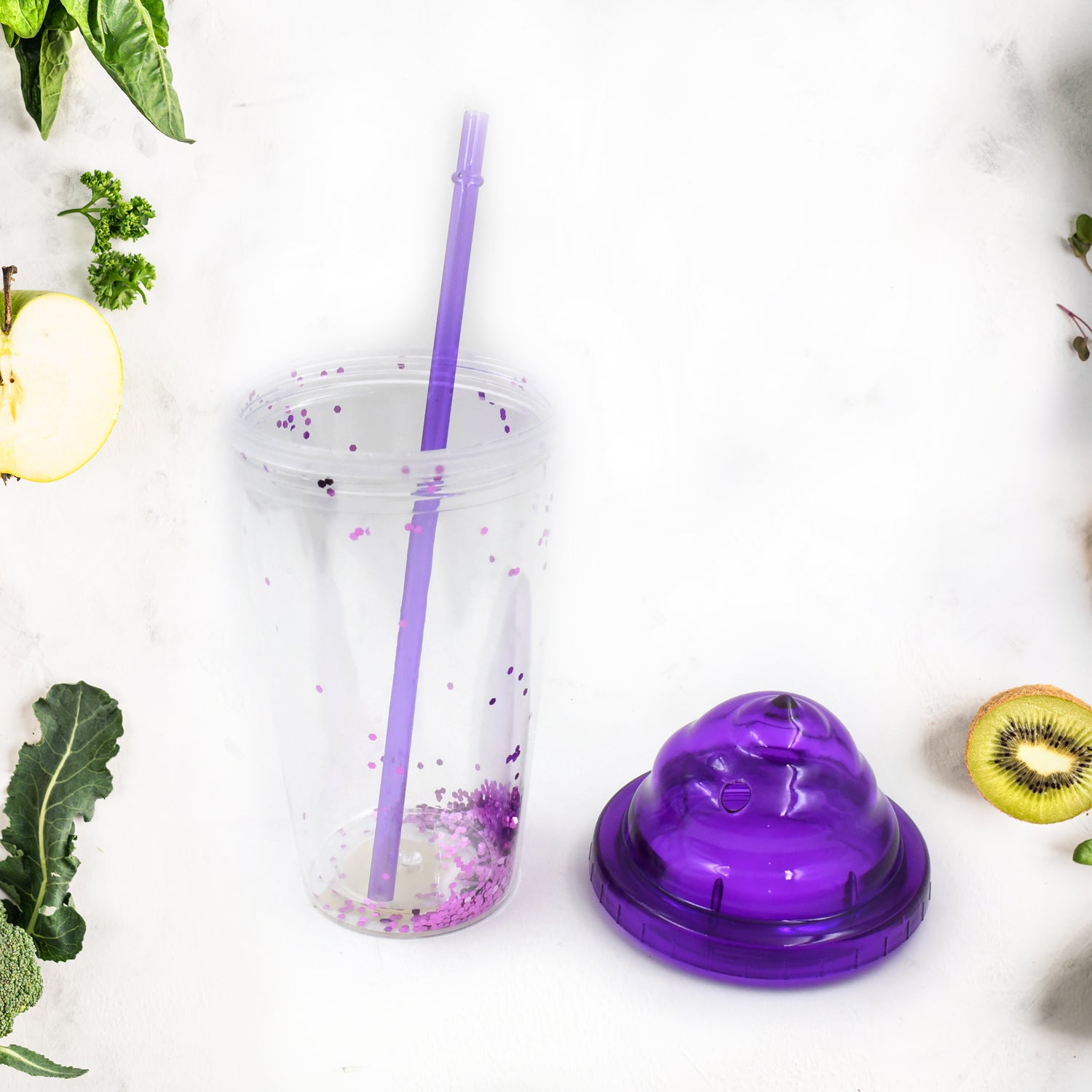 Portable travel tumbler featuring an ergonomic lid and reusable straw, available in vibrant colors.