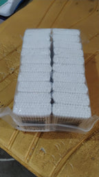 Detailed view of a bamboo cotton swab's pure cotton tip.