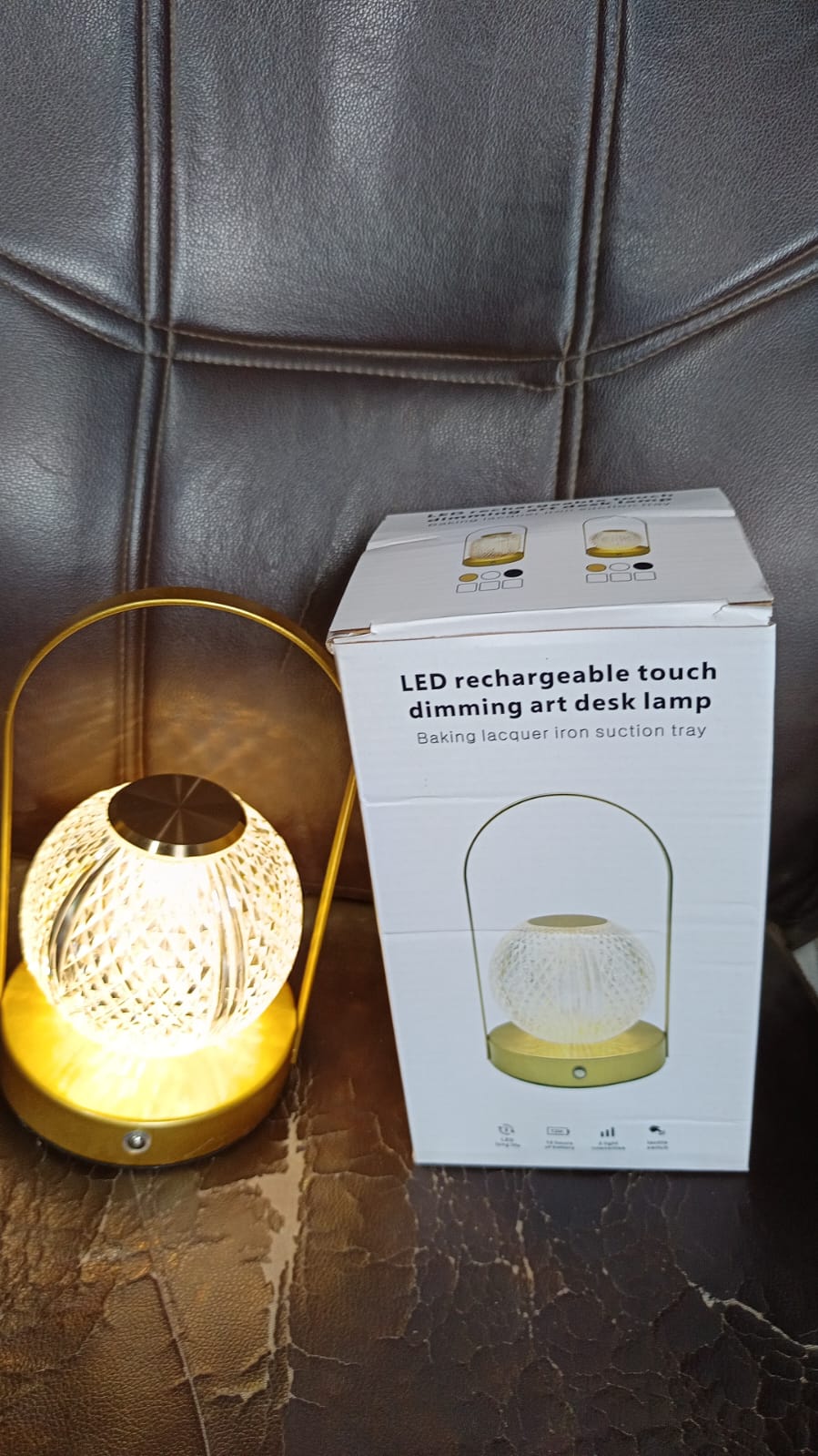 Packaging box for the Indo Glow rechargeable LED touch lamp.