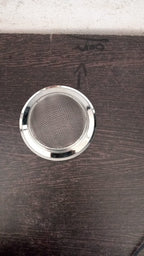 Top-down view of the effective drain stopper, preventing debris from entering the pipes.