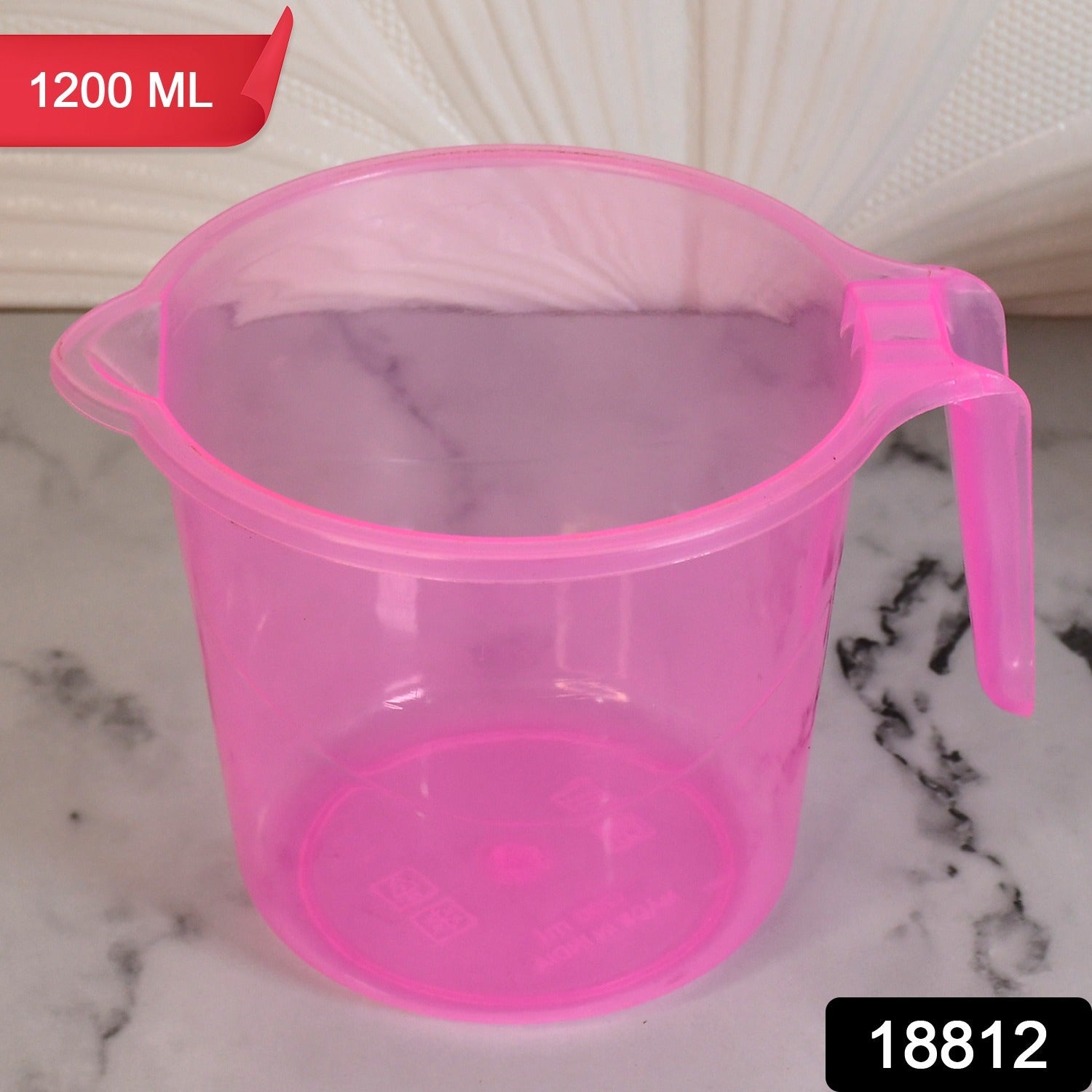 Durable transparent plastic mug with an ergonomic handle, showcasing its 1200ml capacity.