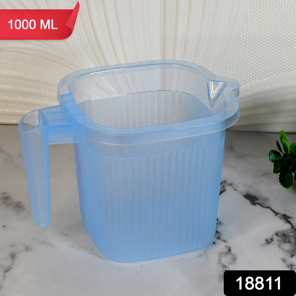 1000 ML Transparent Bath Mug filled with water, showcasing its clear design.
