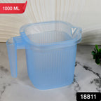 1000 ML Transparent Bath Mug filled with water, showcasing its clear design.