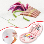 Interior view of the portable sewing kit showing neatly organized needles and scissors.