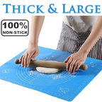 Large non-stick silicone baking mat with measurement guides on a white background.