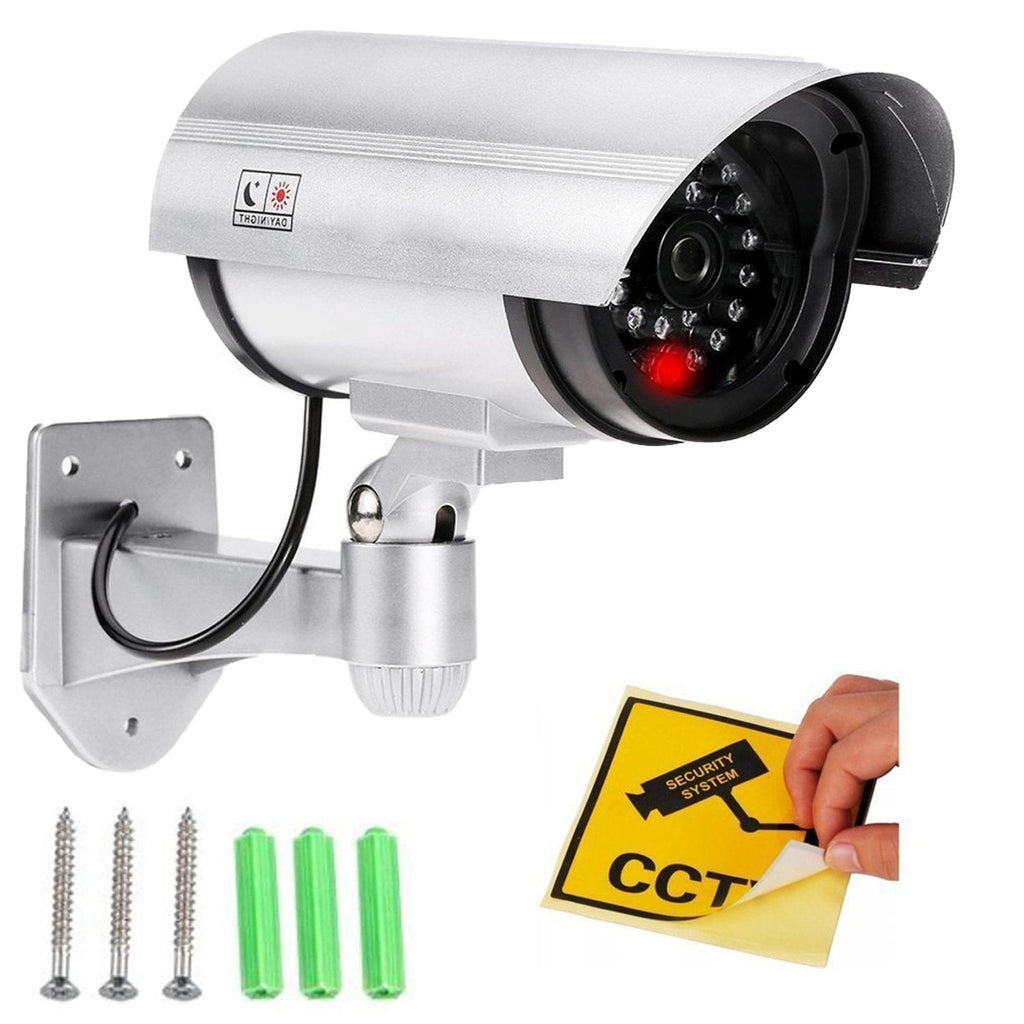 Side view of a realistic fake CCTV camera showing its bullet design and flashing red LED.