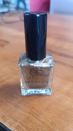 Canvas Gold Metallic Nail Polish 10 ML bottle front view with metallic gold color