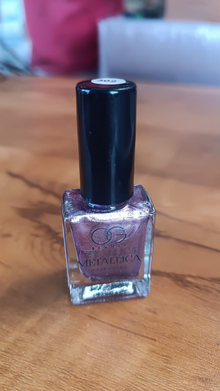 OG Beauty Purple Metallica Nail Polish bottle showing elegant metallic finish