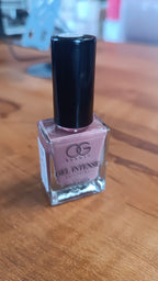 Pastel peach shade gel nail polish bottle ideal for quick dry manicures