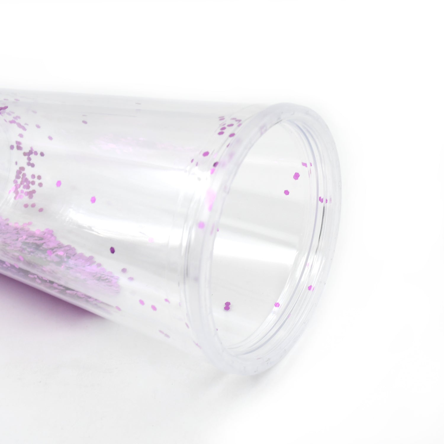 Top-down view of the plastic cold drink tumbler, highlighting its ergonomic lid and straw.