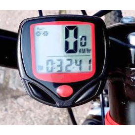 The PowerPulse digital speedometer for bike showing current speed and time, mounted for easy viewing.