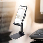 PHOBIA desktop mobile holder supporting a tablet for comfortable use.