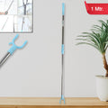Stainless steel telescopic clothes hanger pole extended for high reach in a closet.