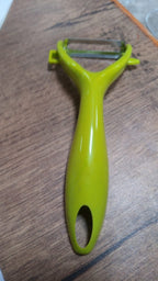 Sturdy stainless steel fruit and vegetable peeler, an essential kitchen tool for every home.
