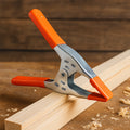 Robust 6-inch heavy duty spring clamp with a strong grip.