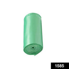 Stack of green eco-friendly garbage bag rolls for daily waste management.