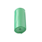 Neatly packaged roll of heavy-duty biodegradable garbage bags, ready for use.