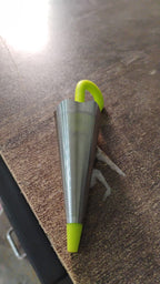 A single umbrella tea strainer isolated on a clean white background.