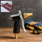 Durable gold hose nozzle with trigger lever for garden watering.