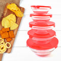 Organivo 5-piece glass bowl set with red lids, showcasing stackable design on a white background.