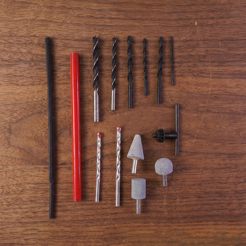 Flatlay of drill bits, grinding stones, screwdriver bits