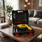 Open case of drill machine tool kit on table lifestyle