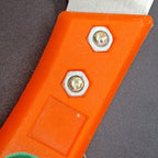 The 270mm tree pruning saw resting on a wooden surface, ready for use.