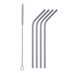 Bent stainless steel straw elegantly placed in a clear drinking glass.