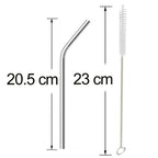 Four shiny bent metal straws and a cleaning brush laid out for inspection.