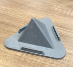 Close-up of Black Pyramid Mobile Stand illustrating premium ABS material