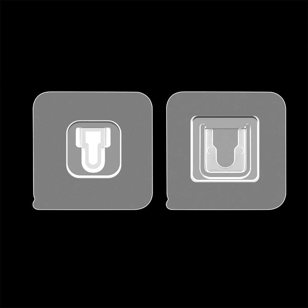 A pair of white heavy-duty adhesive wall hooks for home organization.
