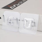 Multiple adhesive hooks displayed together, showcasing versatile use.