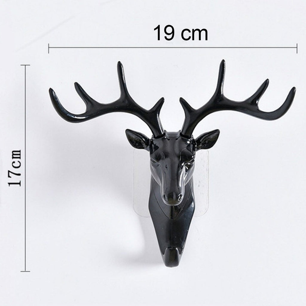 Stylish deer head hook in grey, functioning as a decorative hanger for a hat.