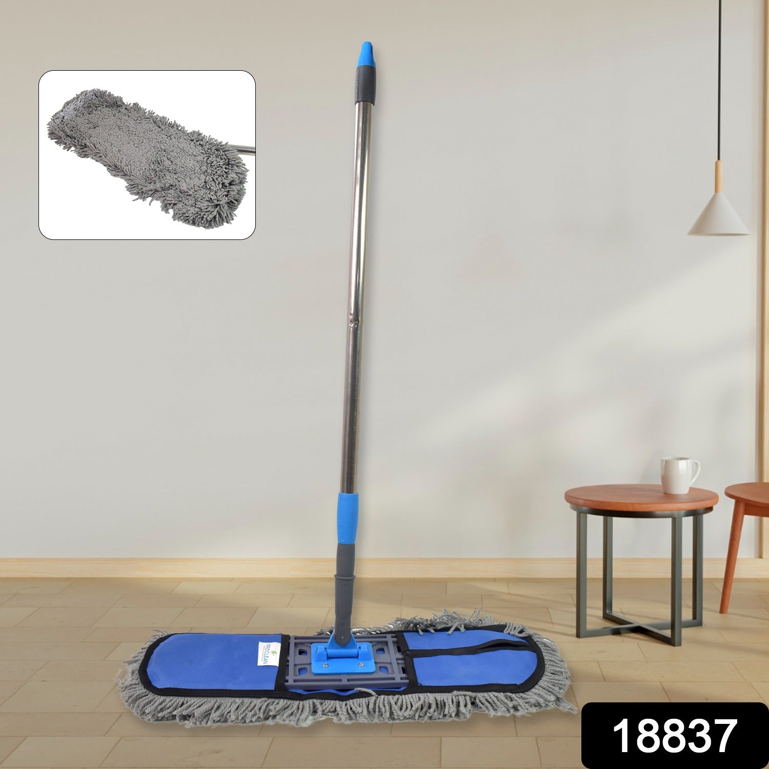Close-up of the cotton pad mop head effectively cleaning a floor surface.
