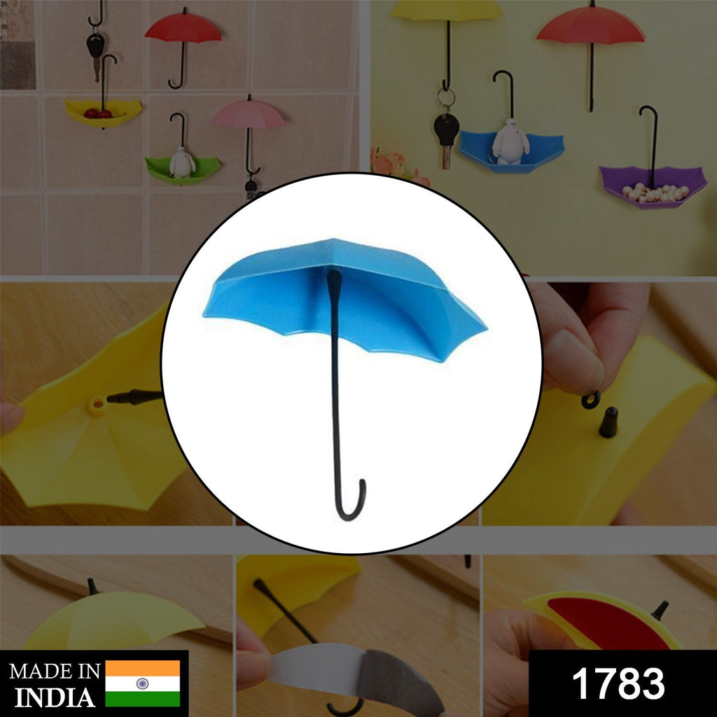 Set of three multi-coloured umbrella key holders arranged decoratively.