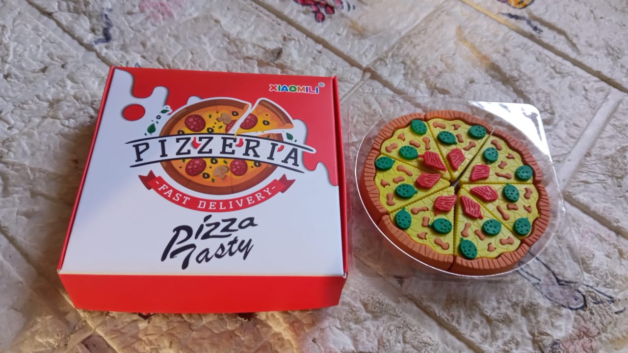 An overhead shot of the 7-piece Pizza Eraser Set, ideal for kids' stationery.