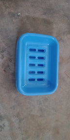 Close-up of the covered soap holder, emphasizing its smooth finish.