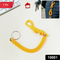 Durable retractable keychain with carabiner clip attached to a belt loop