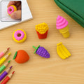 A vibrant Kids Eraser Set featuring assorted 3D food erasers arranged together.