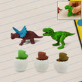 A set of five colorful dinosaur puzzle erasers and egg shapes.