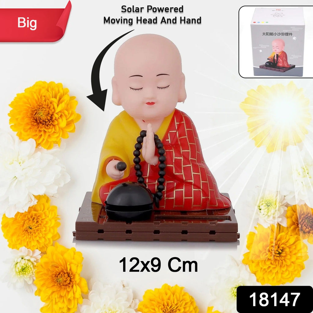Side angle of the solar Buddha statue, showing its compact size and intricate design.