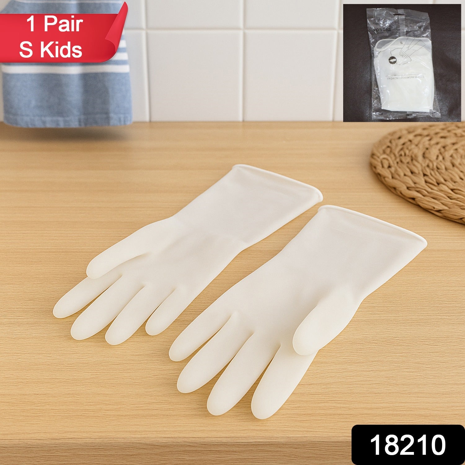 Close-up of small reusable kids cleaning gloves with long cuff for hand protection.