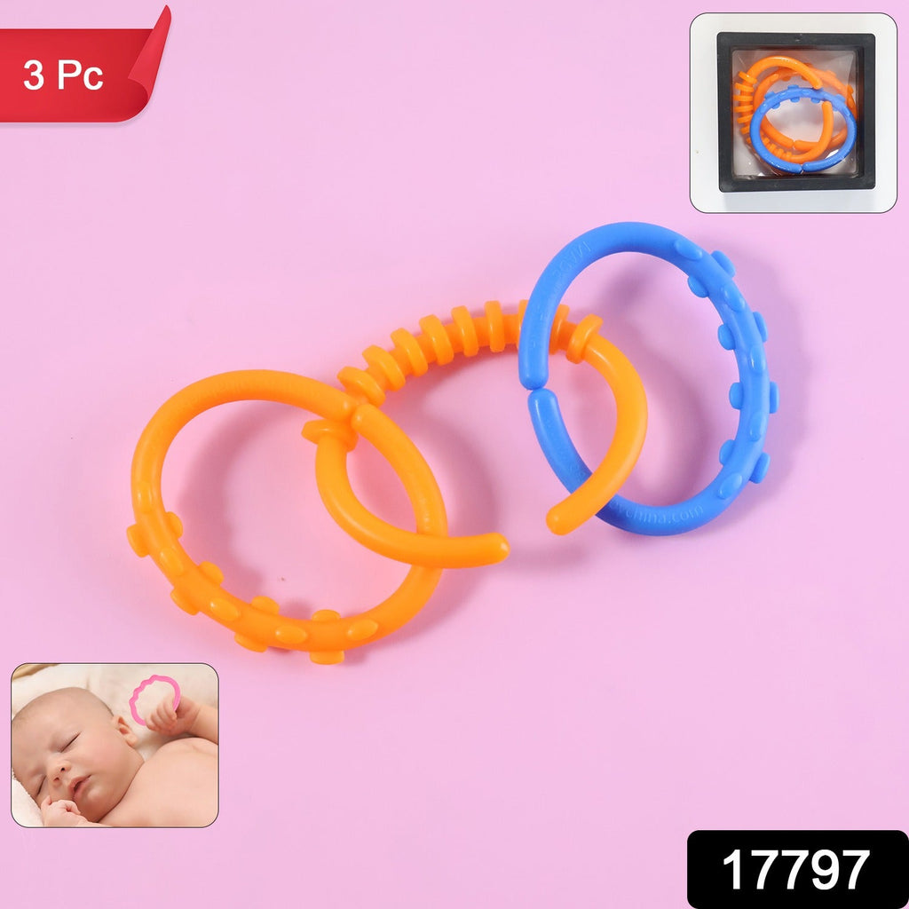 Close-up of linking rings in vibrant colors for infant sensory play