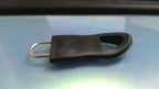 Detailed view of the strong metal component of the Zipper Pull Tab, highlighting its quality.