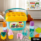 Close-up of the 16 colourful geometric blocks from the Baby Shape Sorter Toy set.
