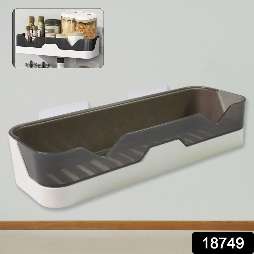 Close-up of the plastic adhesive shower caddy, highlighting its spacious design.