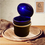 Smokeless car ashtray showing smoke diffuser and closed lid
