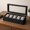 Multi-function jewellery storage box with earring and ring compartments under transparent lid