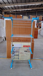 Detail of the clothes drying stand's side wings with dedicated hanger holes.