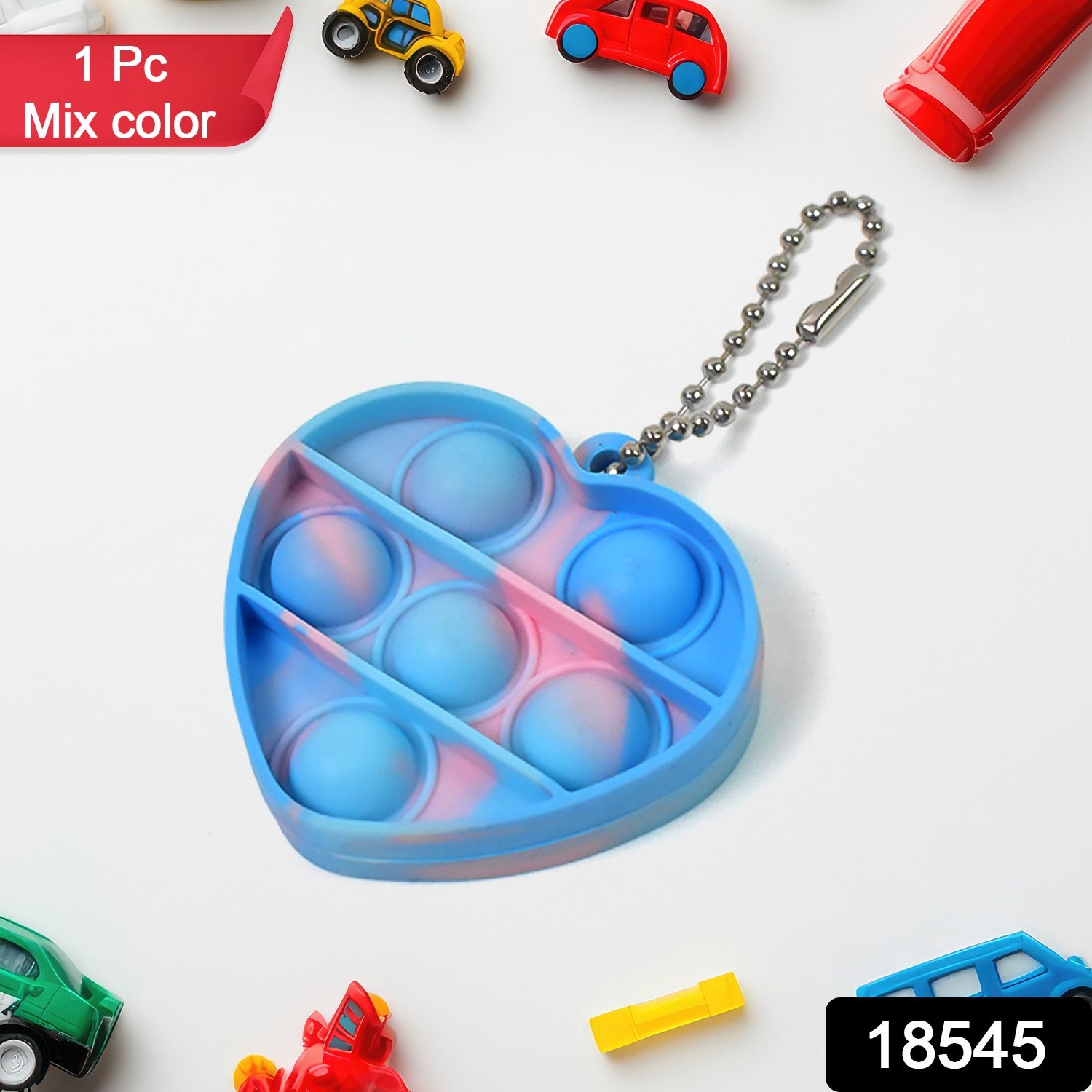 Close-up of a single round mini fidget keychain with colorful pop bubbles, ideal for sensory play.